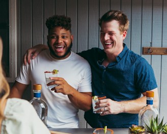 a couple of men standing next to each other