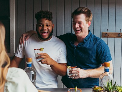 a couple of men standing next to each other